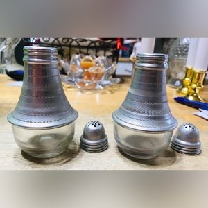 Vintage glass bottom aluminum salt & pepper shakers.
